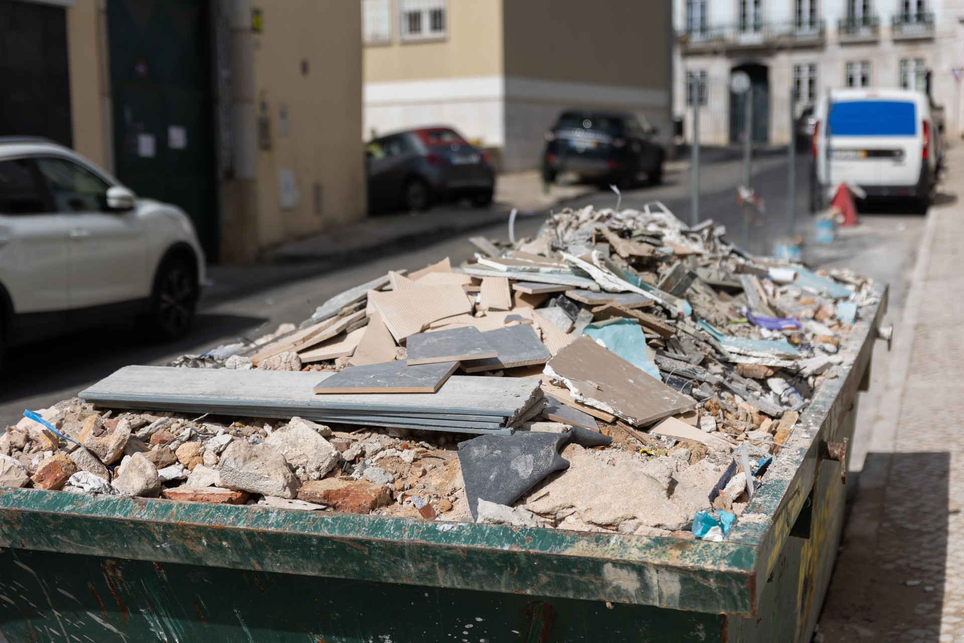 Construction waste in a container on the street